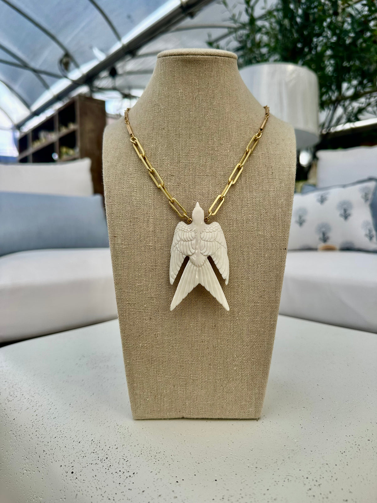 CARVED WHITE SPARROW NECKLACE