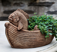 FISH OUT OF WATER STATUE