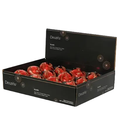 An open black Decoris display box filled with red glass ornaments, photographed on a clean white background.