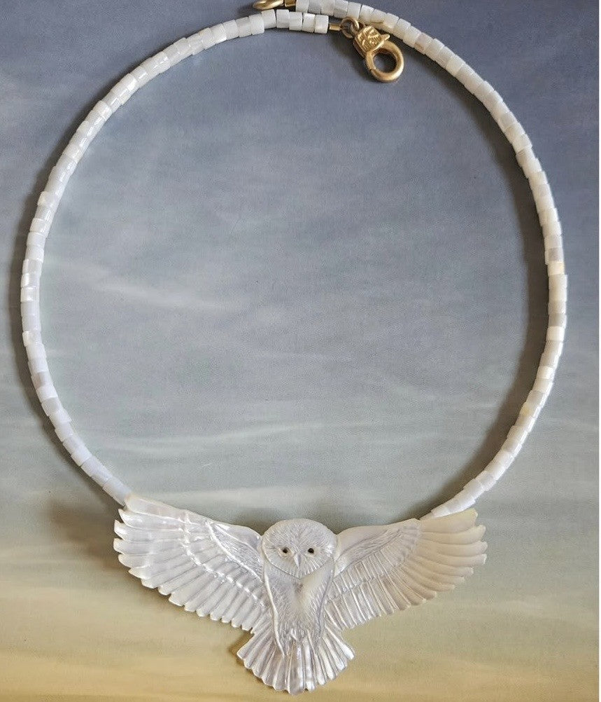 CARVED OWL ON MOTHER OF PEARL BEADS