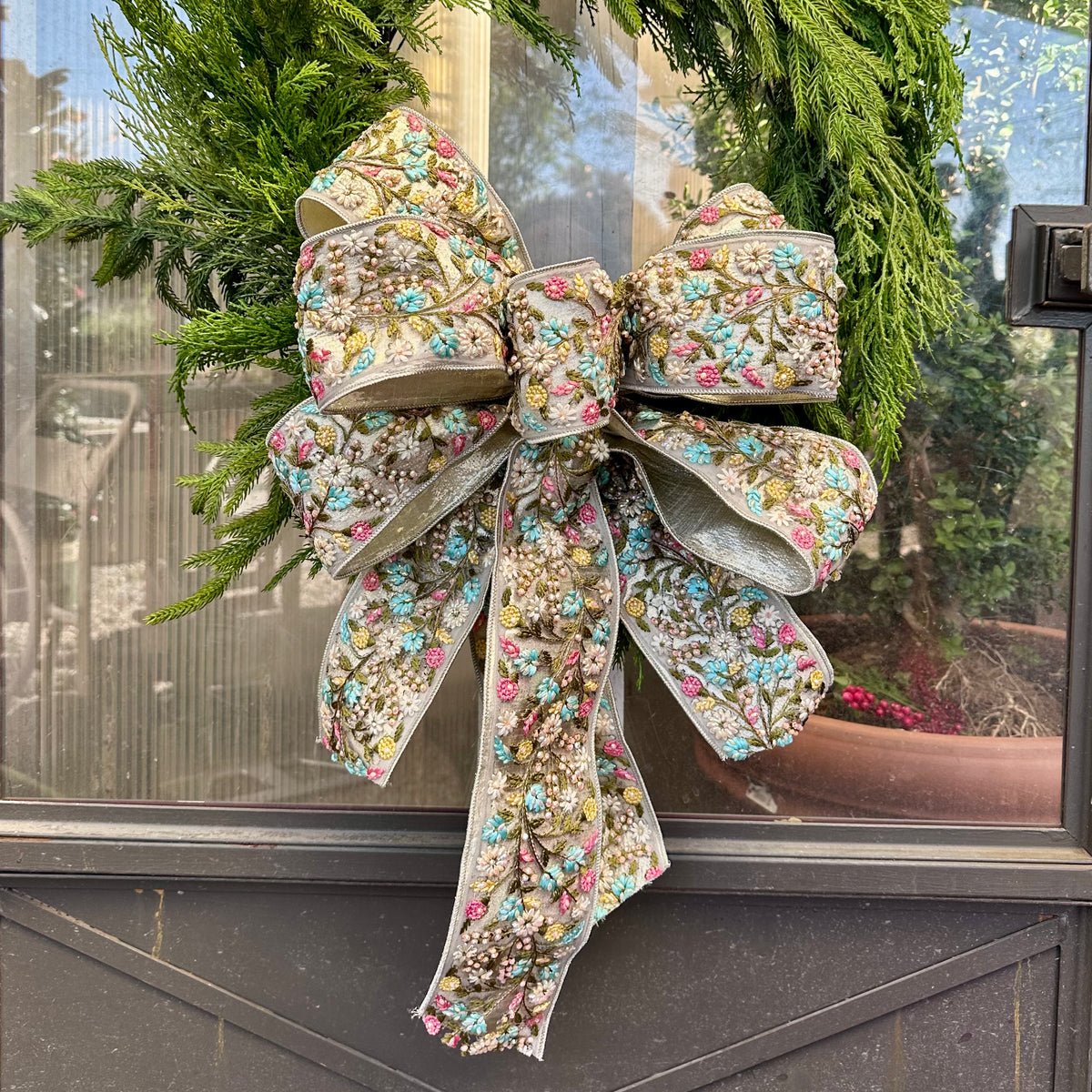 HAND-TIED BEADED APPLIQUE BOW