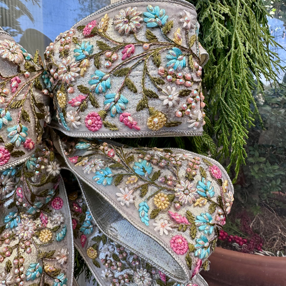 HAND-TIED BEADED APPLIQUE BOW