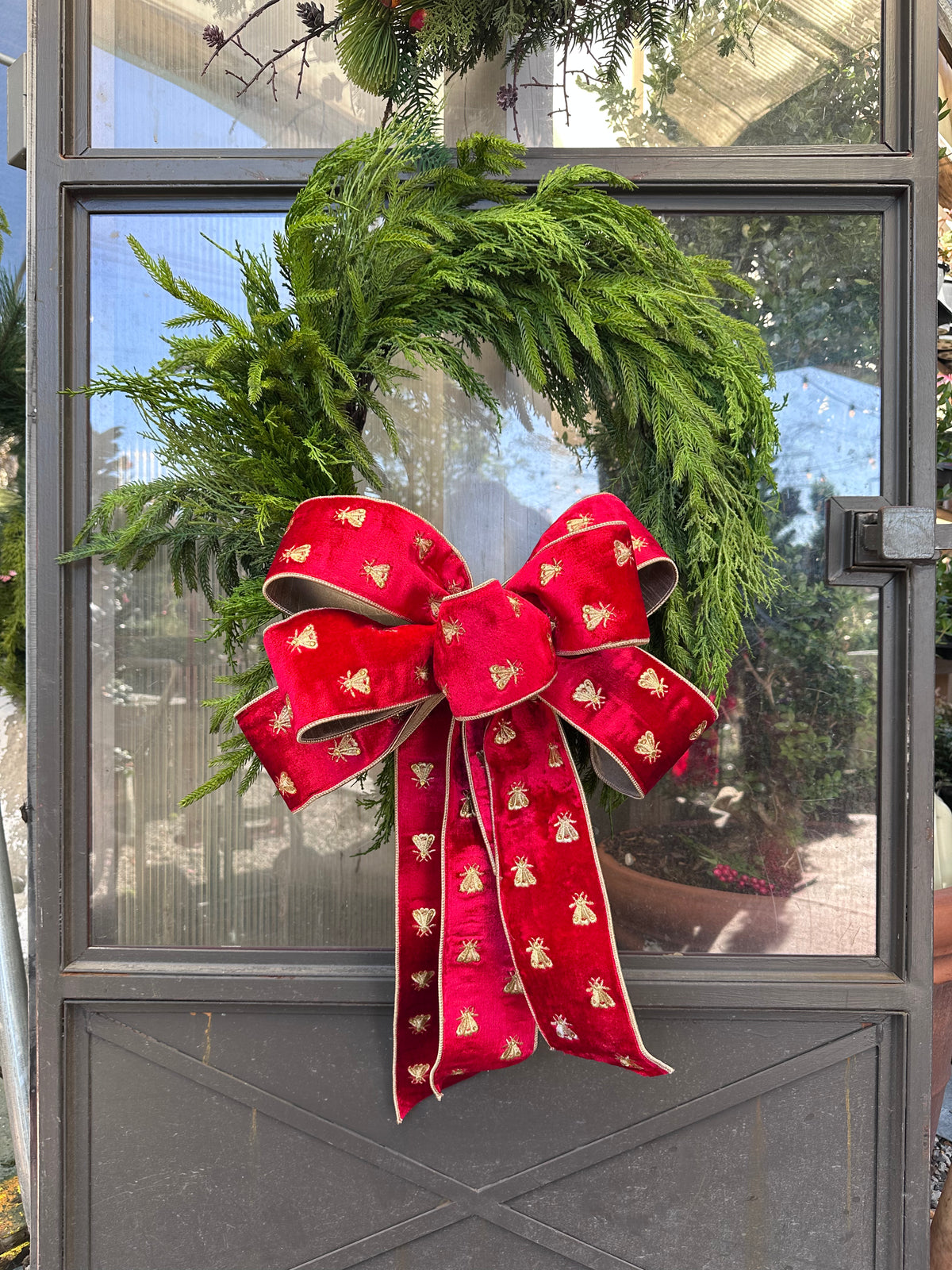 HAND-TIED RED BEE BOW