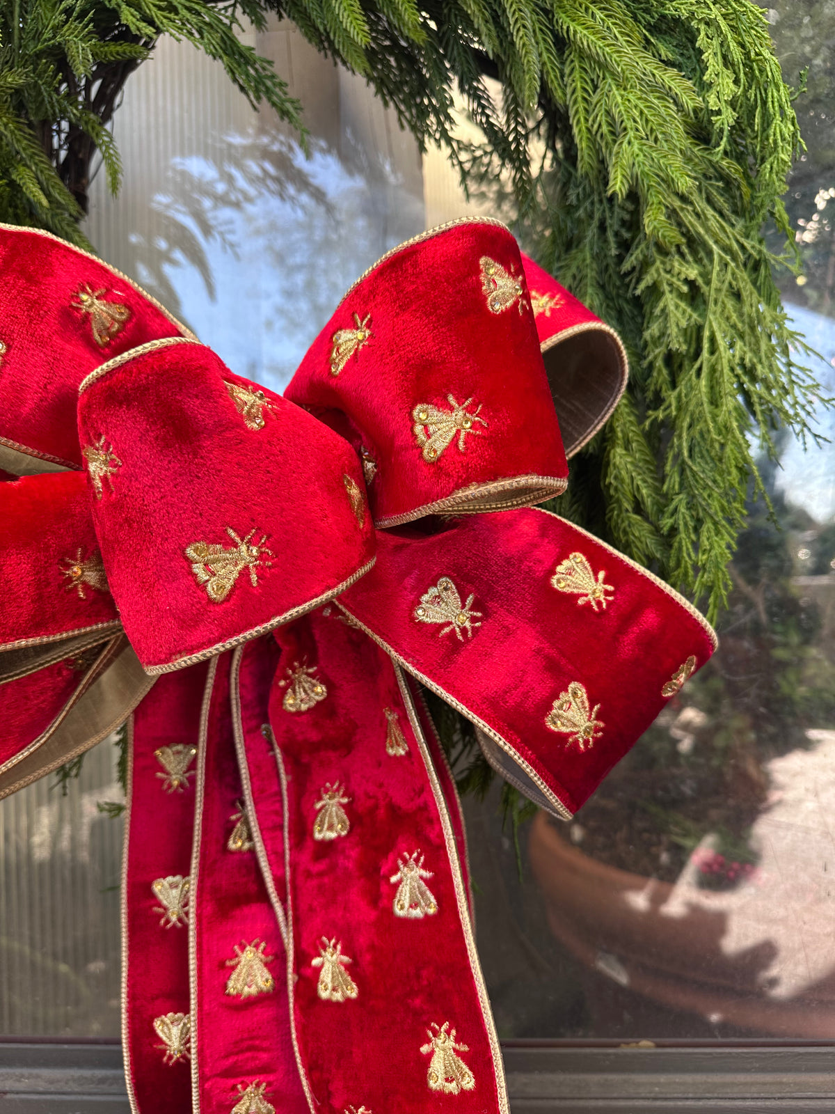 HAND-TIED RED BEE BOW