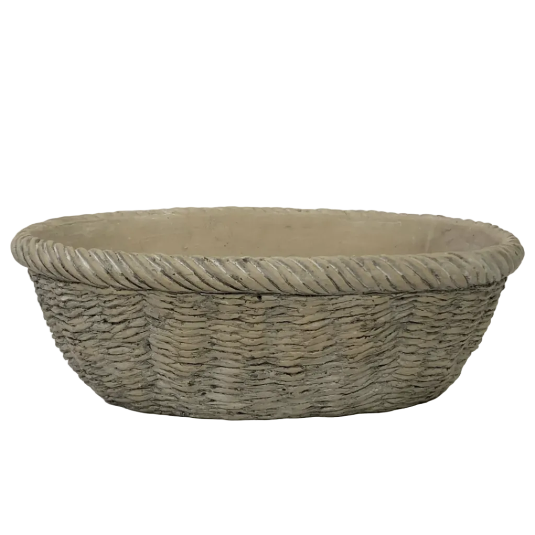 A large oval woven basket with a thick twisted rope border, shown against a plain white background.