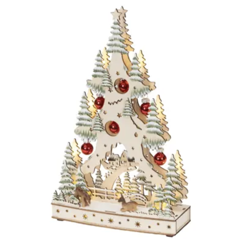 A 3D laser-cut wooden Christmas tree decoration with a winter mountain scene, featuring green pine trees, red ornaments, and warm yellow-gold accents on a white background.