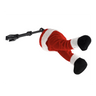 A plush Santa Claus leg and foot toy dangling from a black plastic clip against a plain gray gradient background.