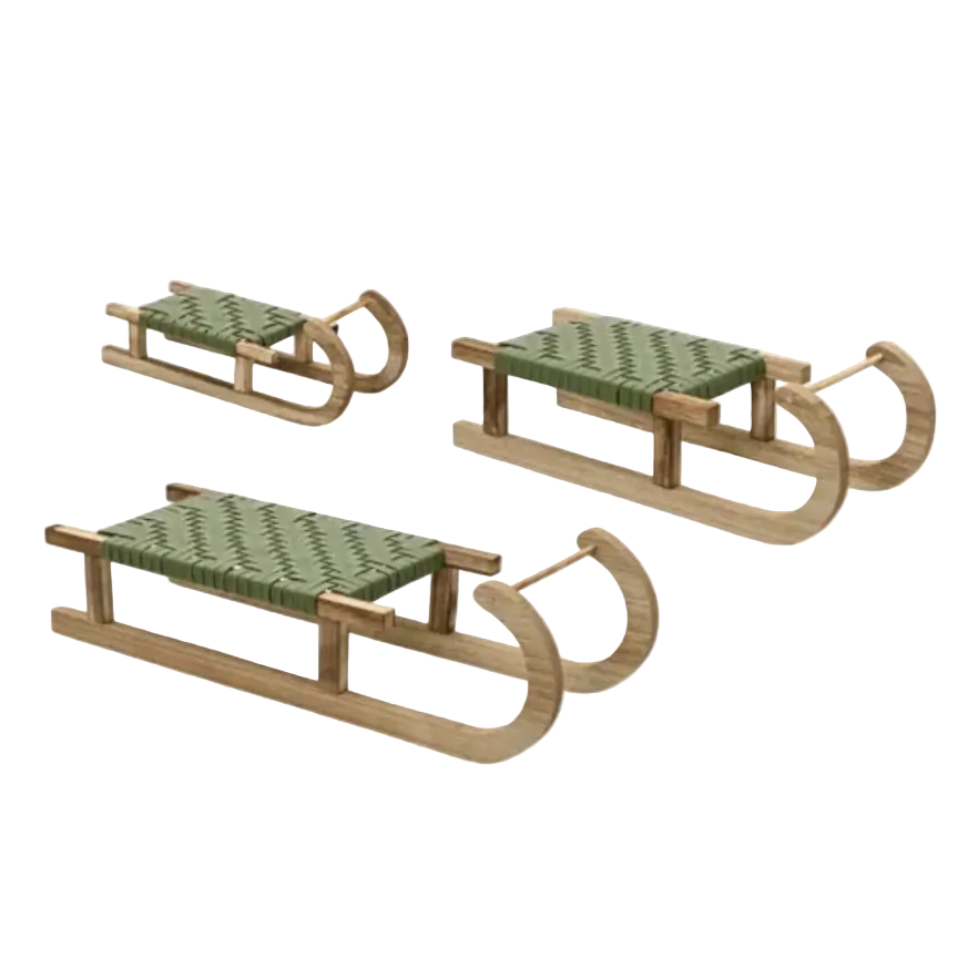 Three wooden sleds with woven green seats in different sizes, shown on a plain white background.