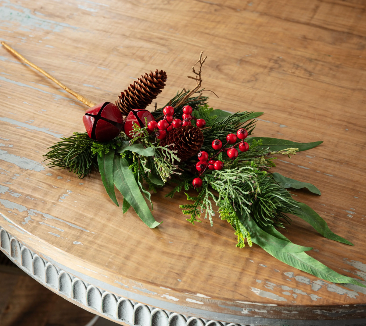 MIXED HOLIDAY GREENERY PICK WITH RED SANTA BELL