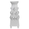 White ceramic vase with textured design on a white background