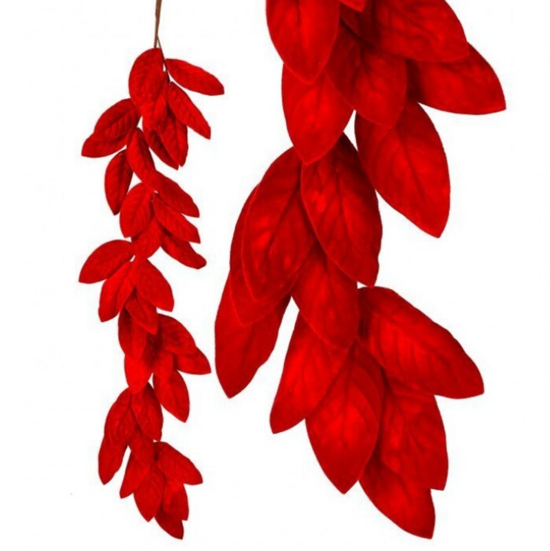 Red faux leaf garland strands hanging against a plain white background.