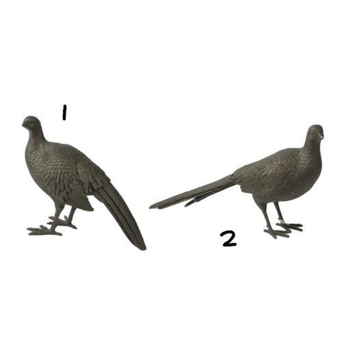 Two dark metal bird figurines shaped like pheasants, shown from different angles on a plain white background.