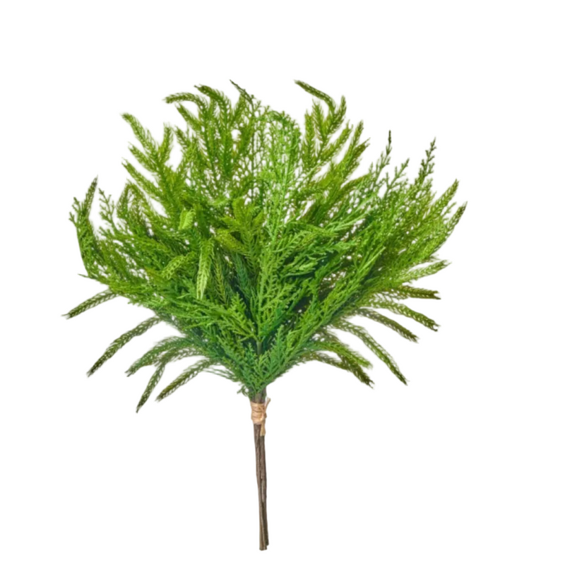 An artificial green pine or fir-style branch bundle with a brown stem, shown on a plain white background. A small dark circular 'NEW!' badge appears in the top-right corner.