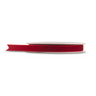 A spool of red ribbon on a plain white background.