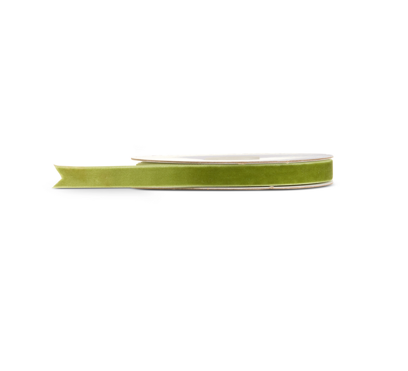A roll of olive green velvet ribbon on a clean white background.