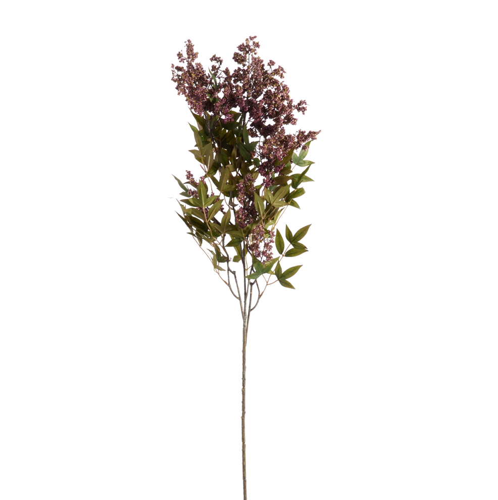 A single artificial flowering branch with clusters of small dusty burgundy-purple blossoms and green leaves on a long brown stem, isolated on a white background.