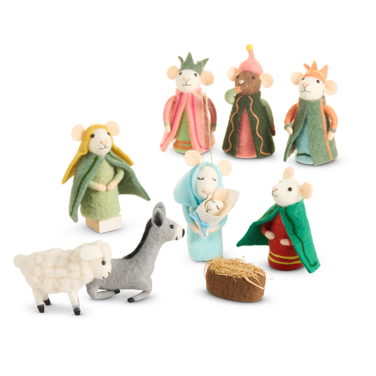 A set of small felt nativity figurines on a plain white background, including stylized human characters in colorful robes and two animals, a white sheep and a gray donkey, with a small hay bale.