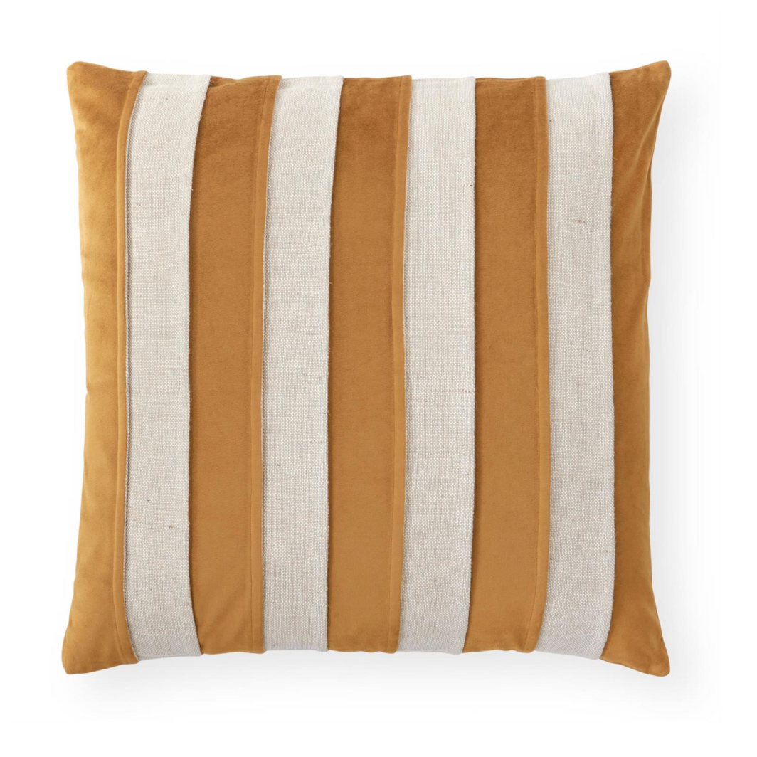 A square decorative throw pillow featuring alternating vertical stripes of warm mustard yellow velvet and textured off-white linen, shown against a plain white background.